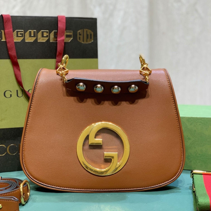 G*u*i top handle bags